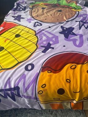 Squishmallows Snuggle Throw 50”x70” Just Lunchin - Yellow, Purple, Orange, Brown